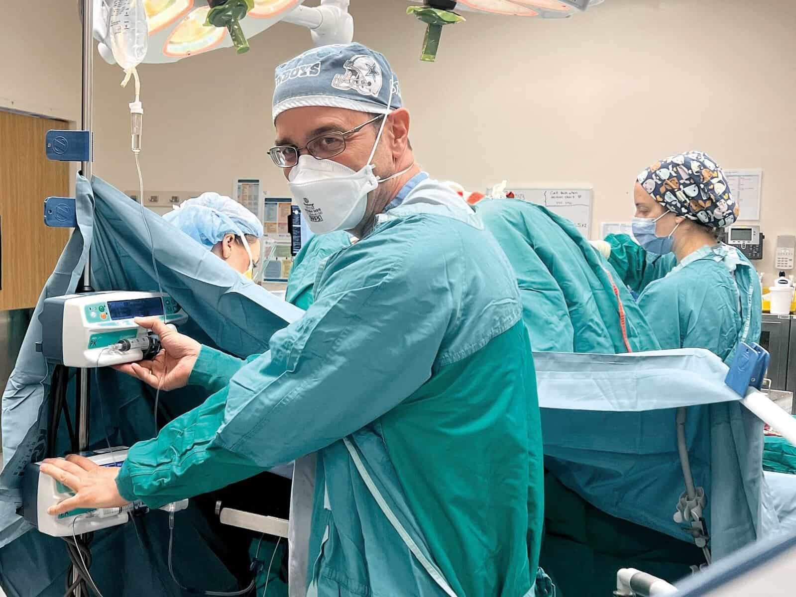Innovation in anesthesia. 1 Anesthesiologist in blue scrubs in the operating room.