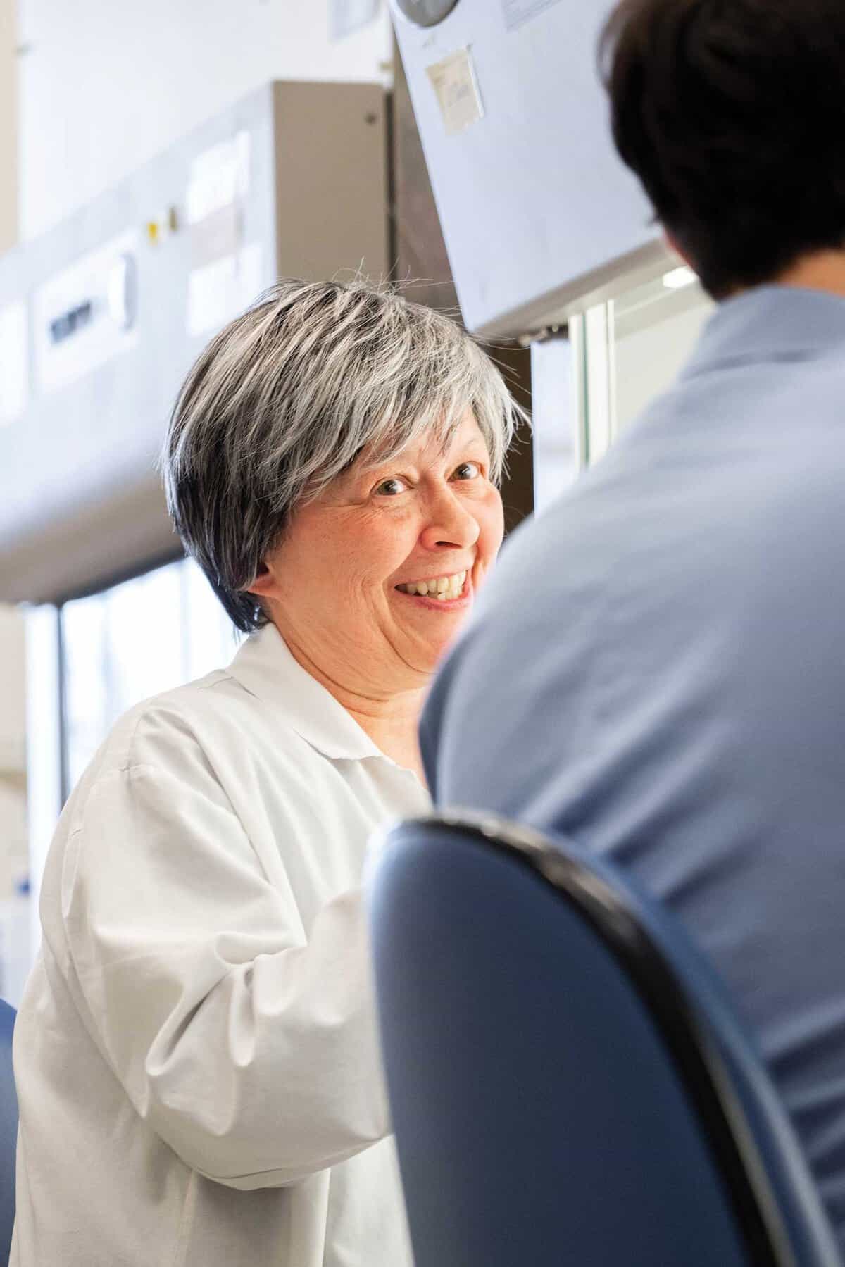 Groundbreaking research offers new hope for metastasized prostate cancer treatment. 1 Doctor smiling in white coat.